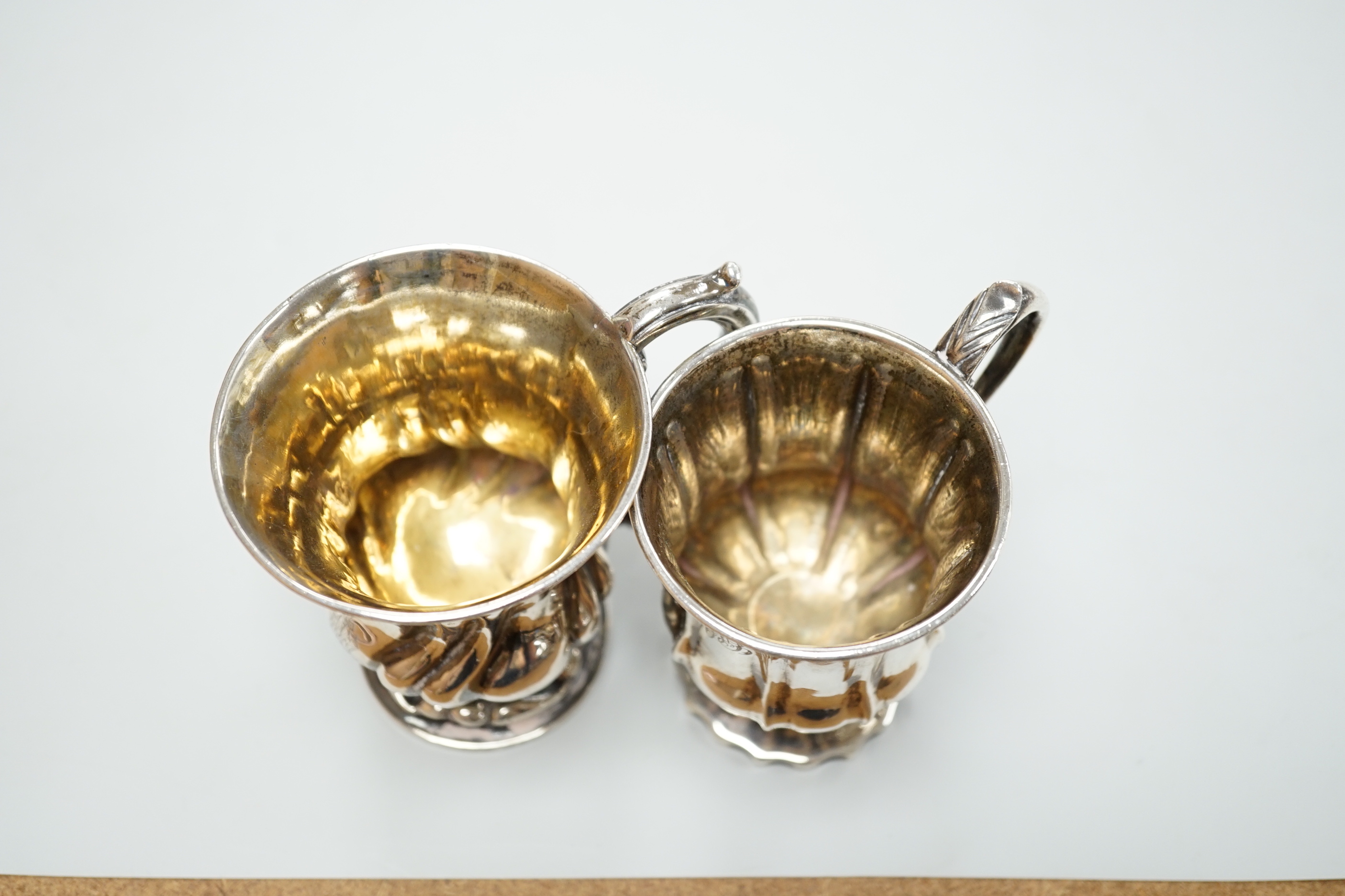 Two William IV silver vase shaped christening cans, London, 1831 and London, 1834, both approx. 9cm, 7.7oz.